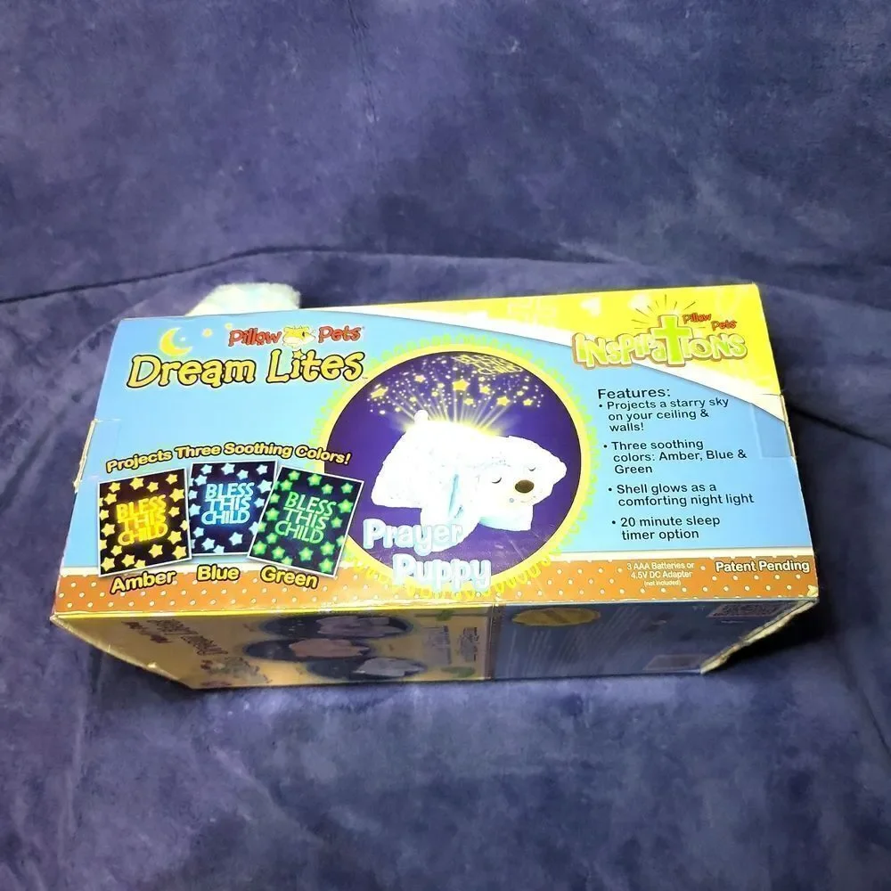 Dream lites prayer puppy! the night light that turns your room into a starry sky